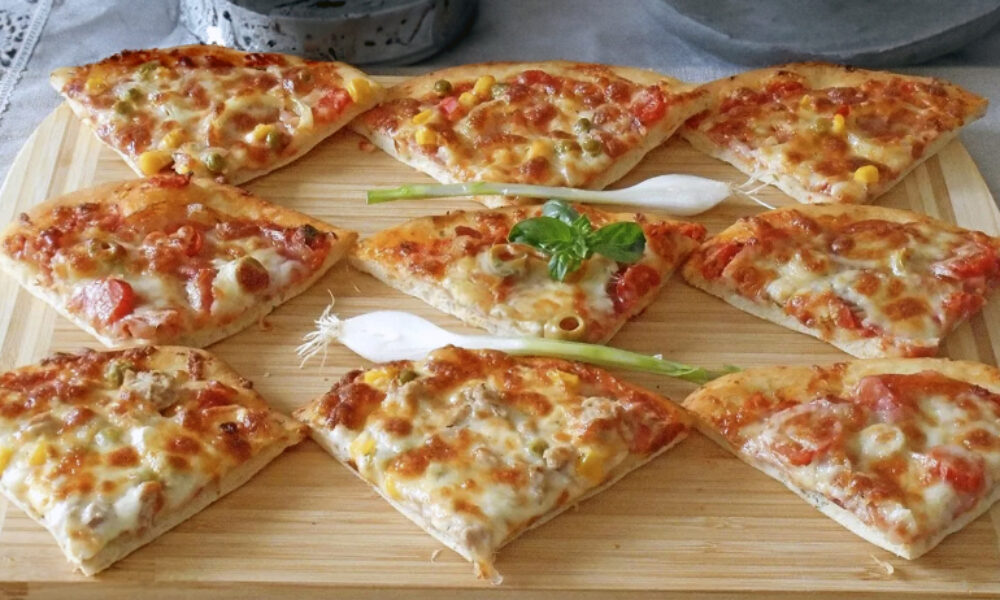 Najlepšie cesto na pizzu vďaka jednej prísade: Špeciálny recept na domácu pizzu, ktorý sa oplatí vyskúšať!