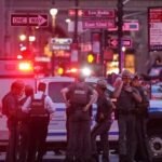 A gunman shot and killed four people, including an NYPD officer, in a Manhattan office building before taking his own life.
