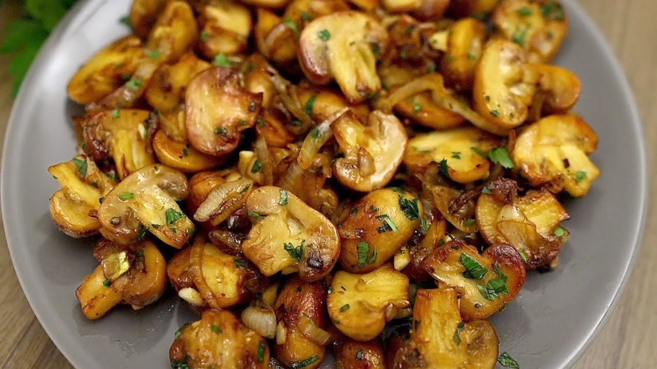 Rezept für leckere gebratene Champignons mit Zwiebeln. Ganz einfach und schnell!